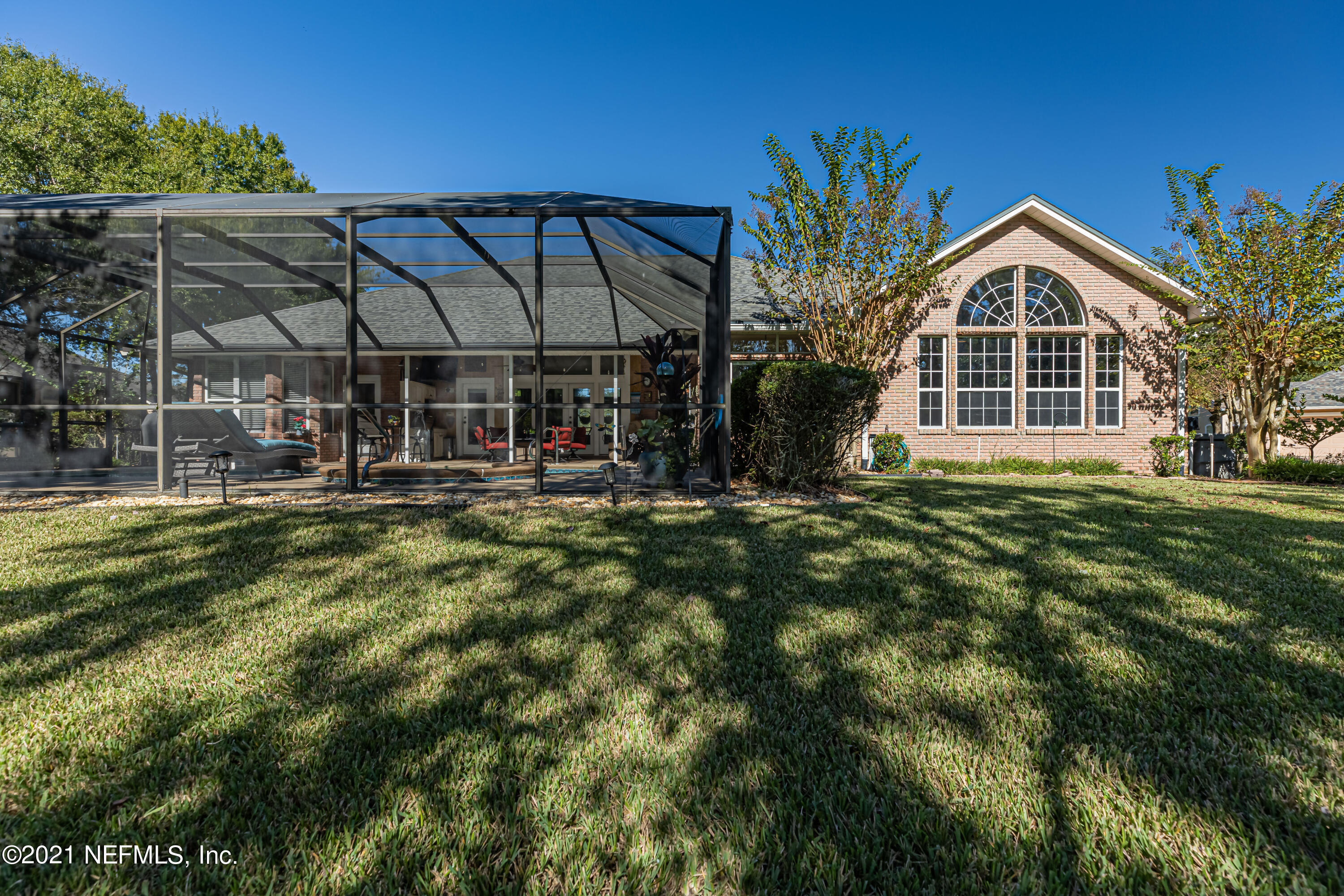 1827 Wild Grape Lane Fleming Island, FL 32003 - Photo 43 of 51 a view of a house with a yard