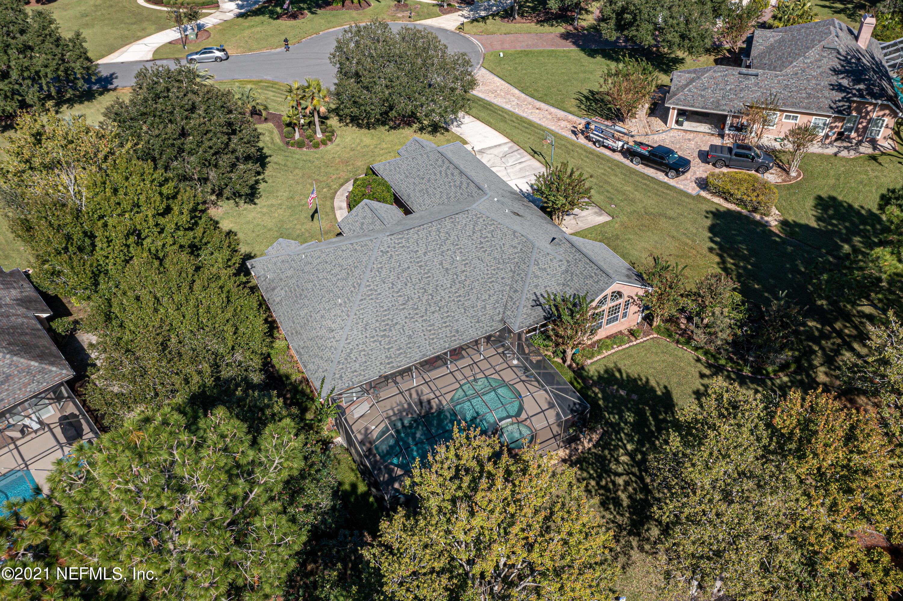 1827 Wild Grape Lane Fleming Island, FL 32003 - Photo 51 of 51 an aerial view of a house with a yard and lake view