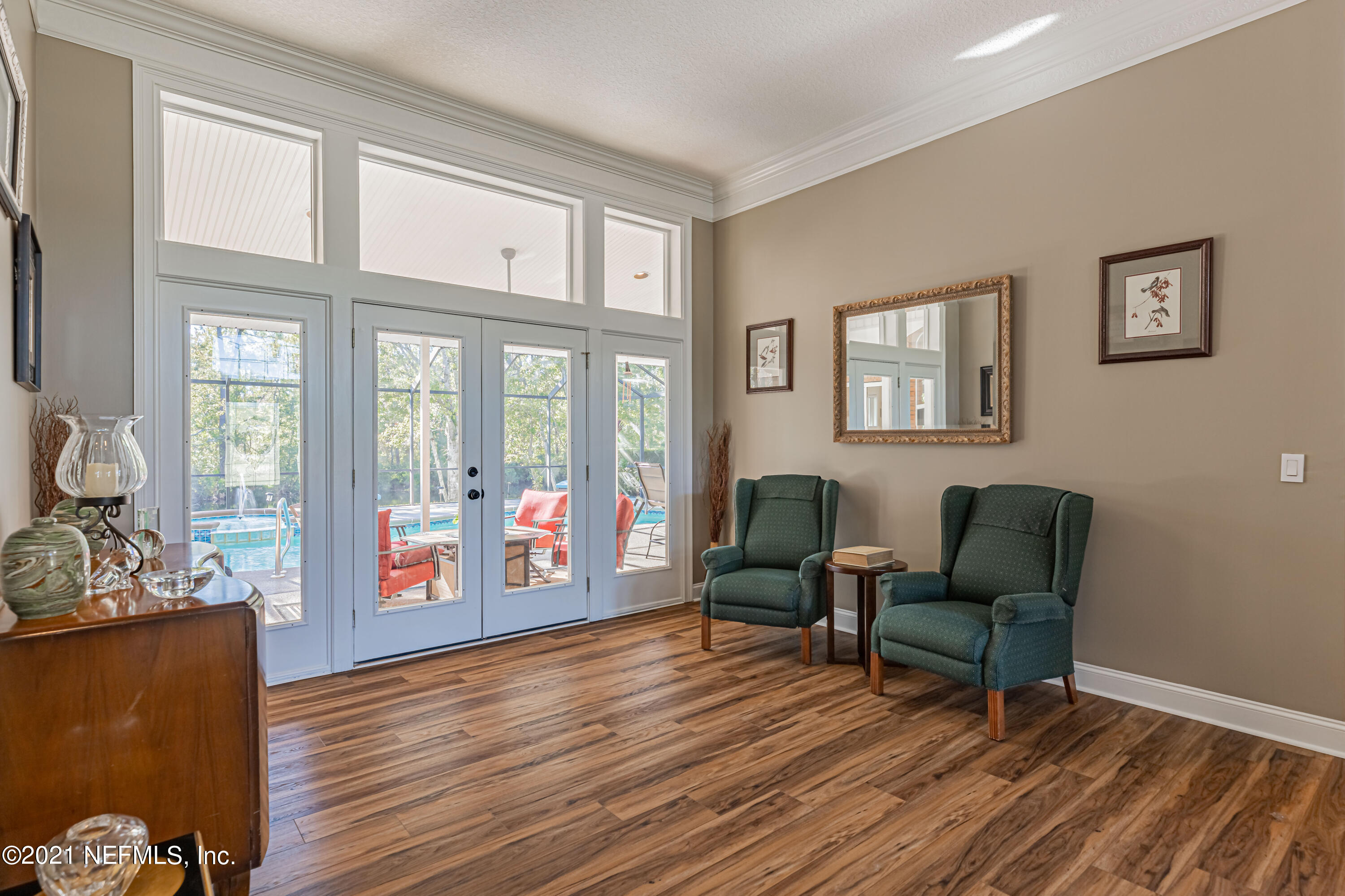 1827 Wild Grape Lane Fleming Island, FL 32003 - Photo 8 of 51 a living room with furniture and a window