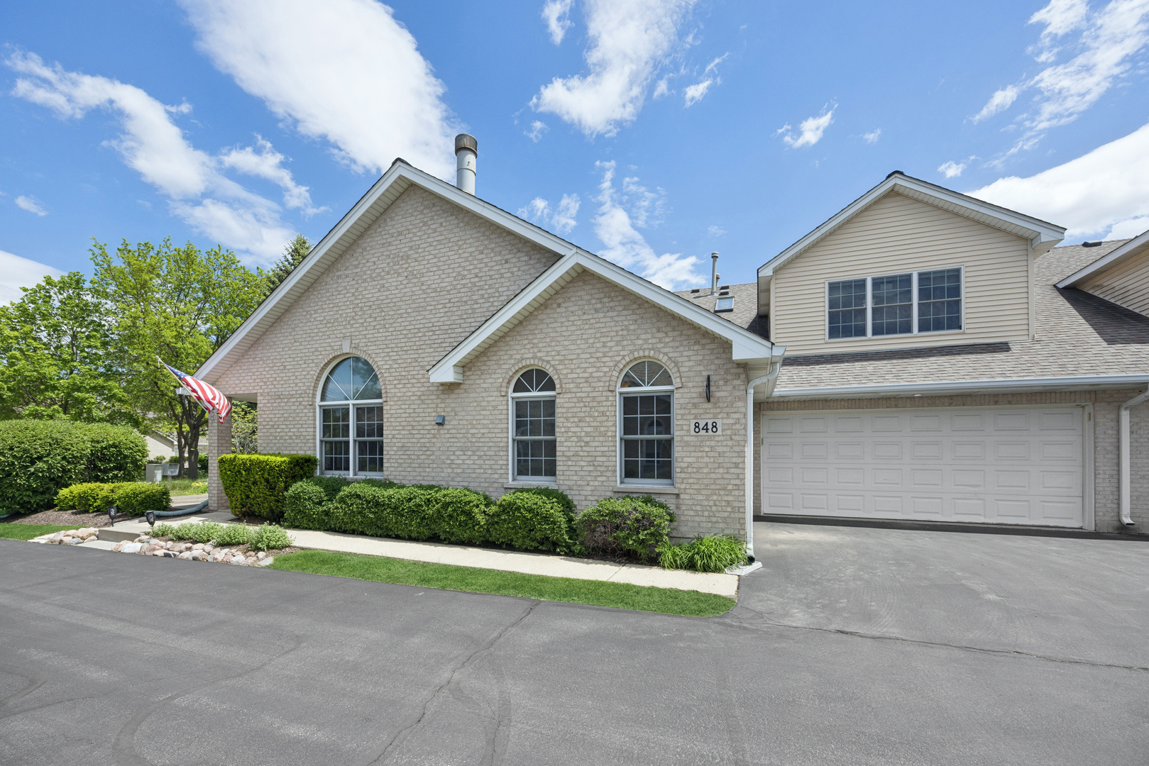 848 Havenshire Road, Unit 848 Naperville, IL 60565 - Photo 1 of 23 a view of a white house with a yard and large tree