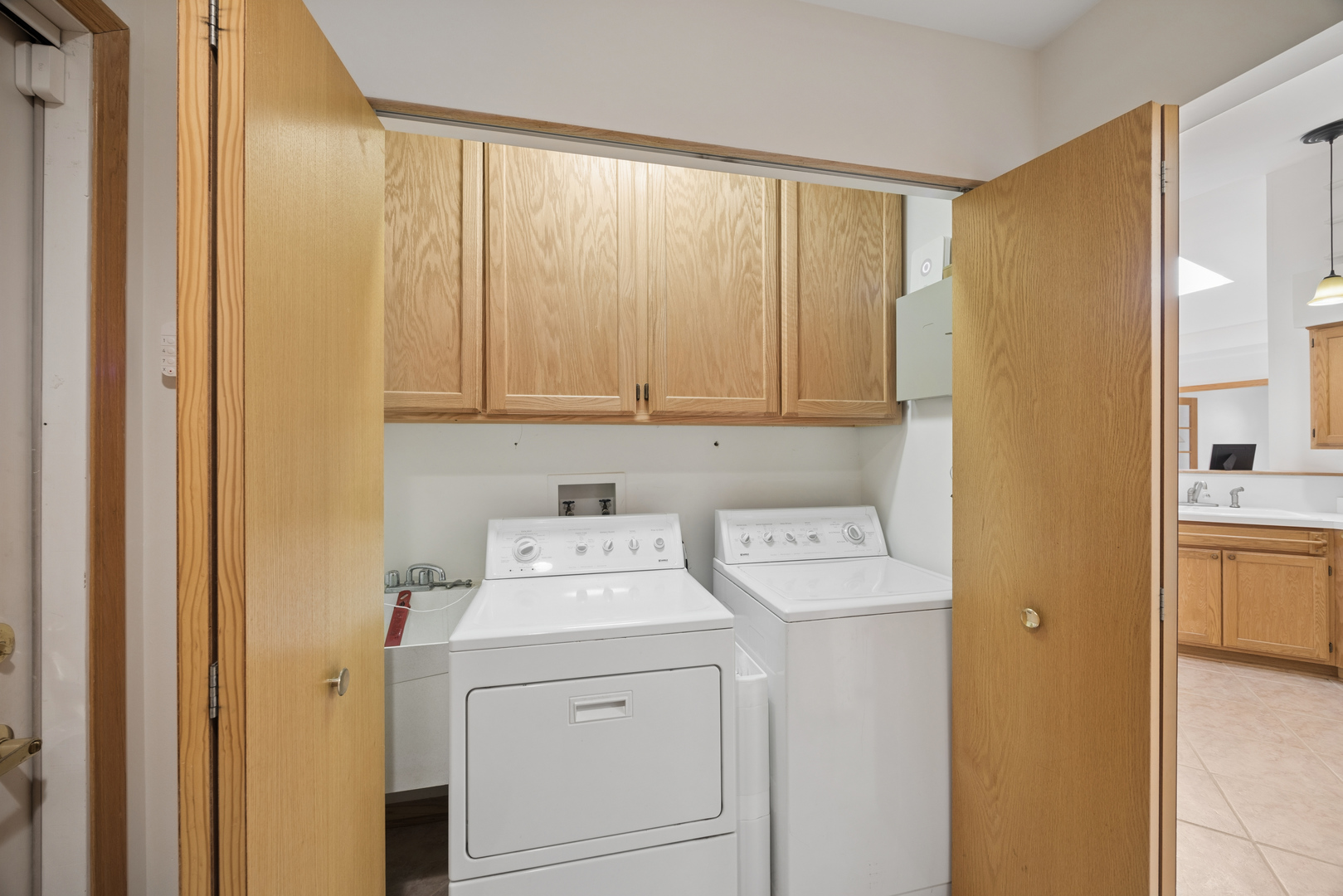 848 Havenshire Road, Unit 848 Naperville, IL 60565 - Photo 14 of 23 a utility room with dryer and washer