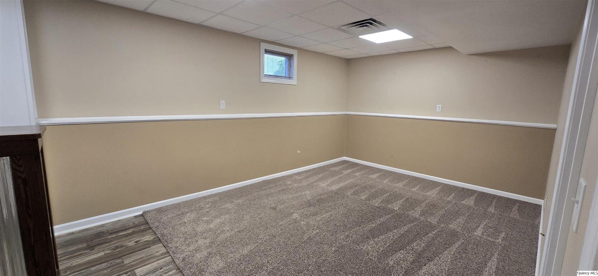 200 Dallas Road Carthage, IL 62321 - Photo 15 of 20 an empty room with a workbench