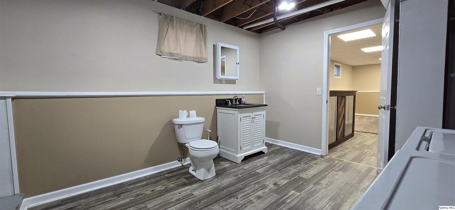 200 Dallas Road Carthage, IL 62321 - Photo 18 of 20 a bathroom with a toilet and a shower