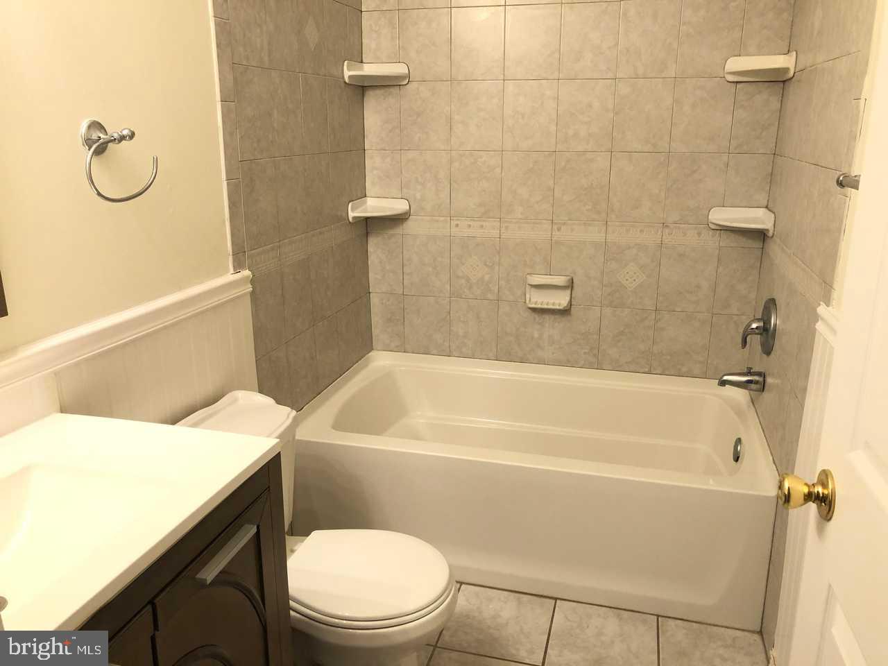 332 Cold Spring Place Dover, DE 19904 - Photo 14 of 30 a bathroom with a granite countertop bathtub shower sink vanity and toilet