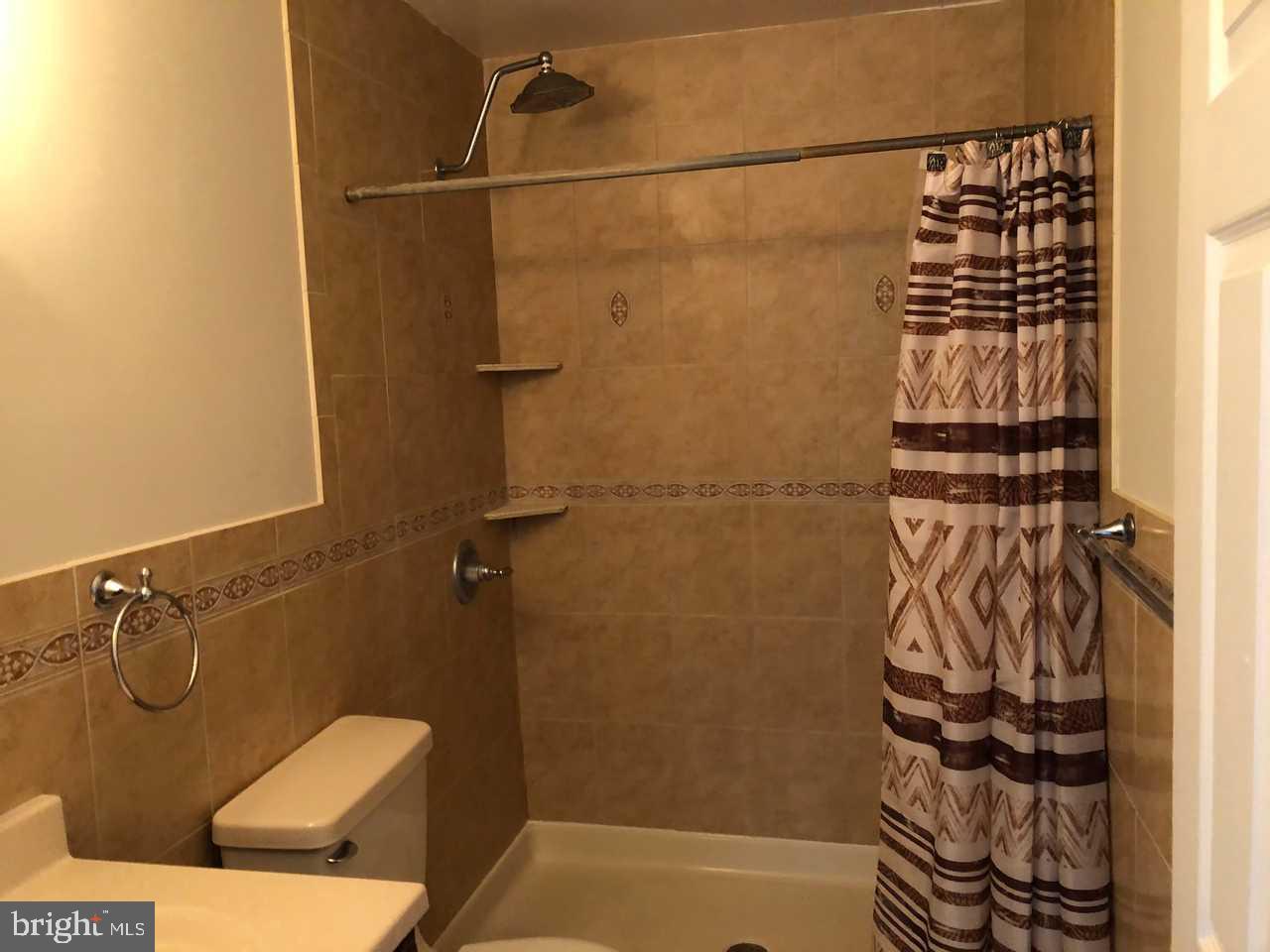 332 Cold Spring Place Dover, DE 19904 - Photo 17 of 30 a bathroom with a shower