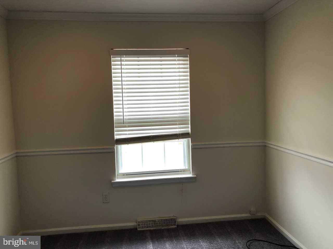 332 Cold Spring Place Dover, DE 19904 - Photo 21 of 30 a view of a small space with wooden floor and a window
