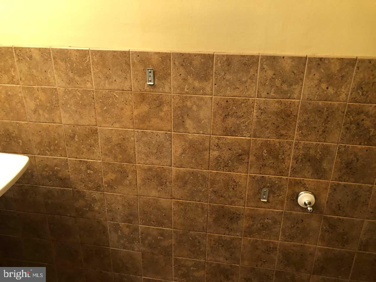 332 Cold Spring Place Dover, DE 19904 - Photo 25 of 30 a bathroom with a blue shower