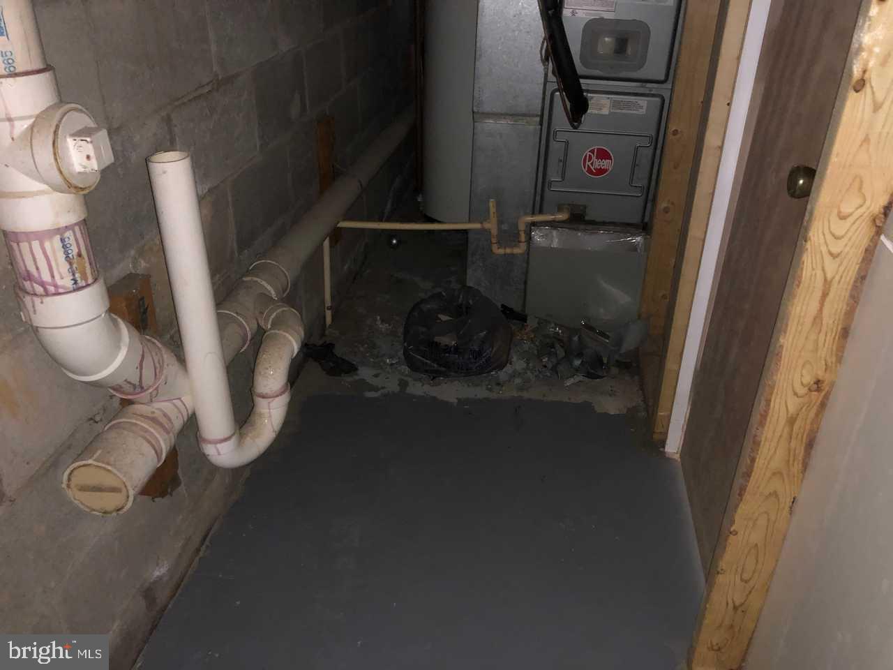 332 Cold Spring Place Dover, DE 19904 - Photo 28 of 30 a bathroom with a toilet and a sink