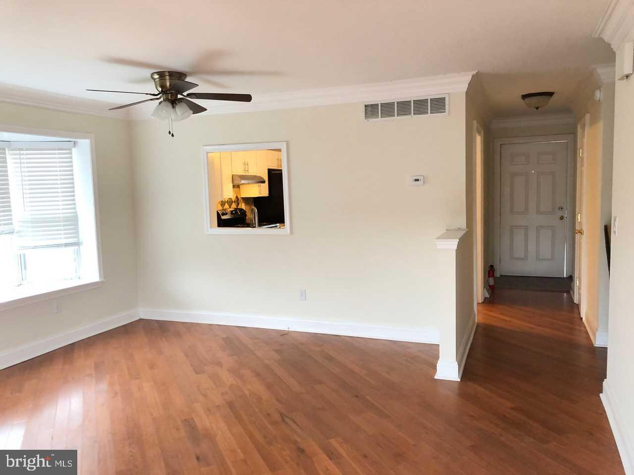 332 Cold Spring Place Dover, DE 19904 - Photo 4 of 30 wooden floor in an empty room with a window