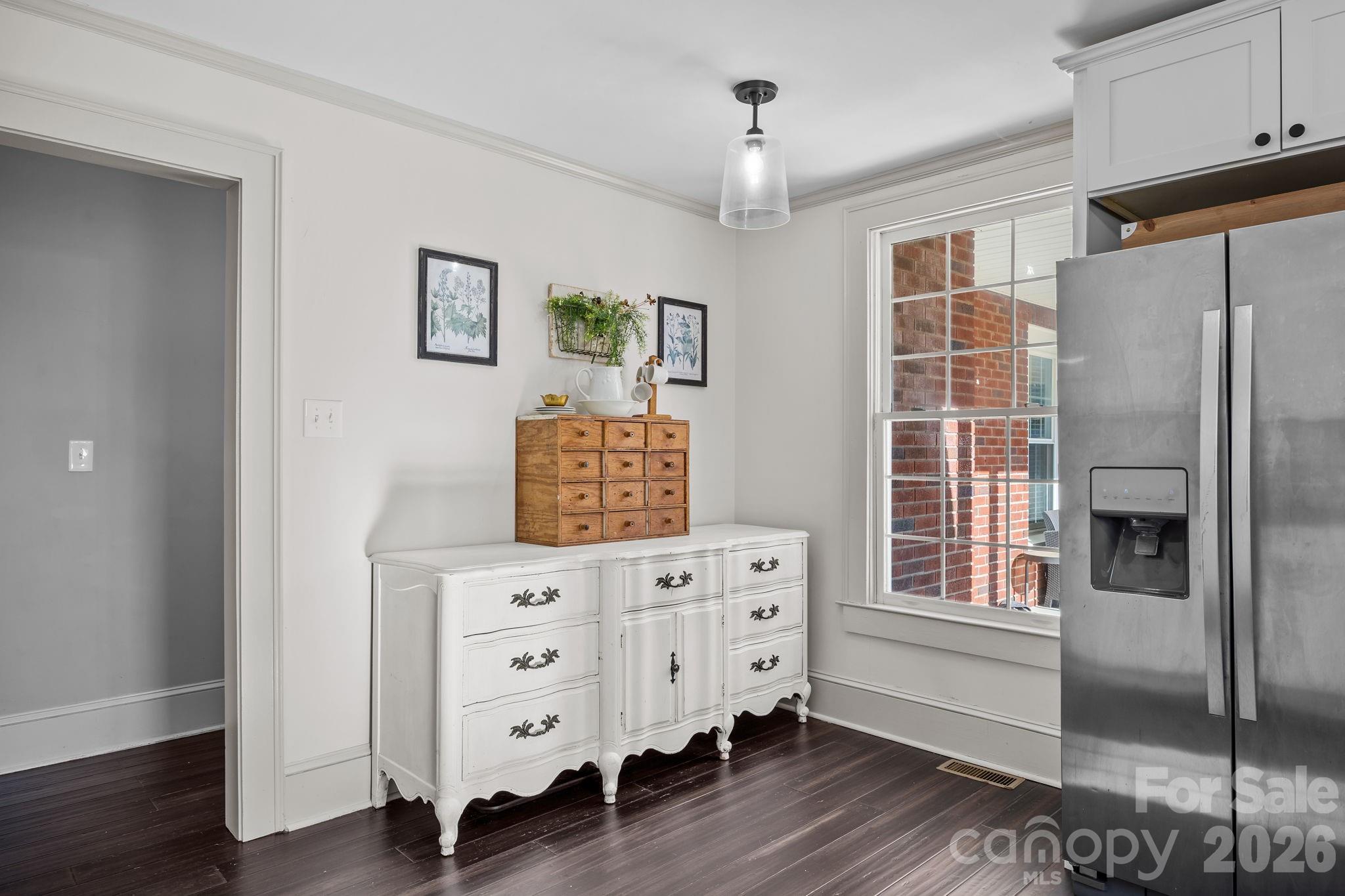 455 Eudy Road China Grove, NC 28023 - Photo 16 of 32 a hallway with cabinets and wooden floor