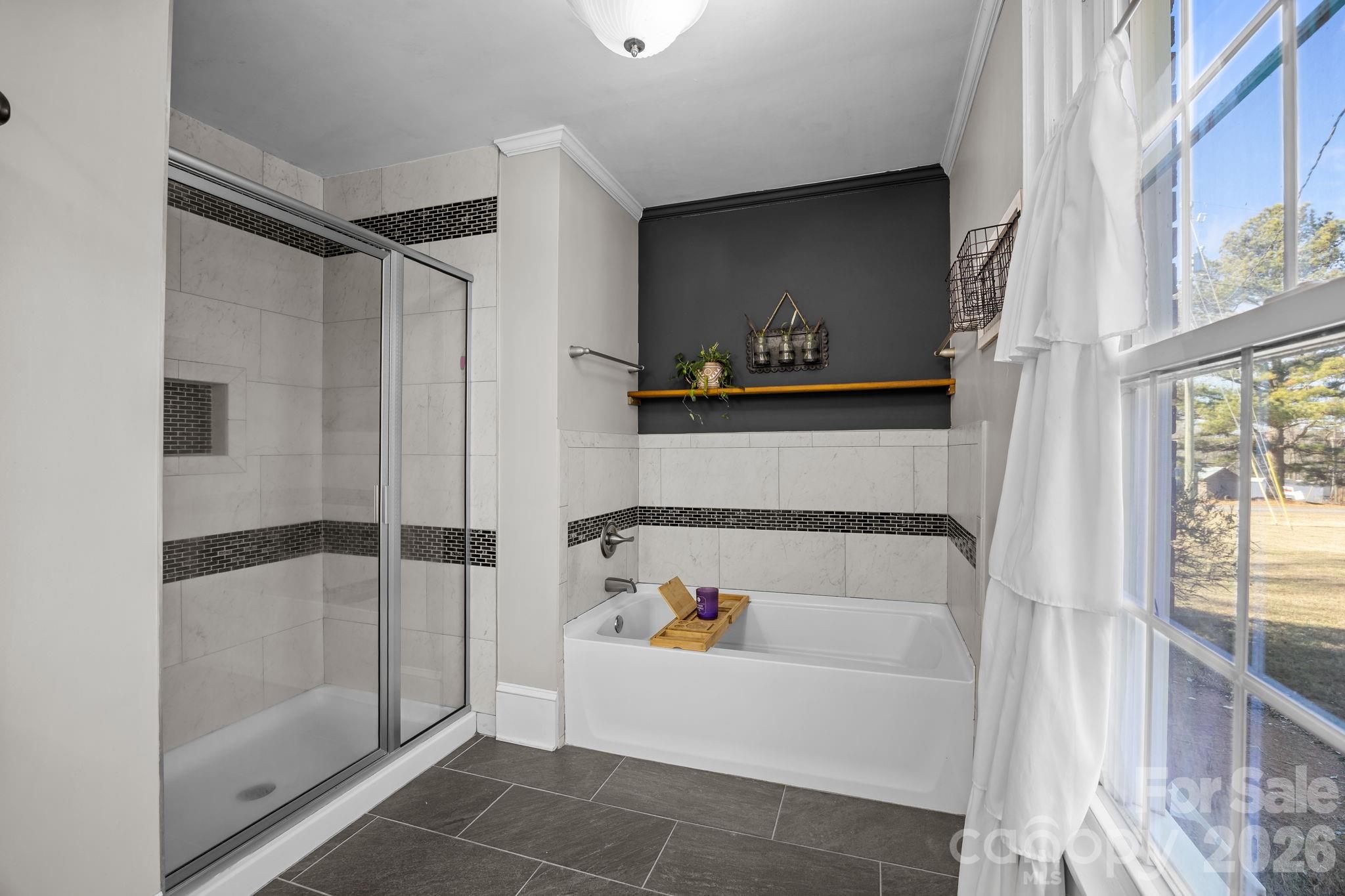 455 Eudy Road China Grove, NC 28023 - Photo 22 of 32 a bathroom with a bathtub and a shower