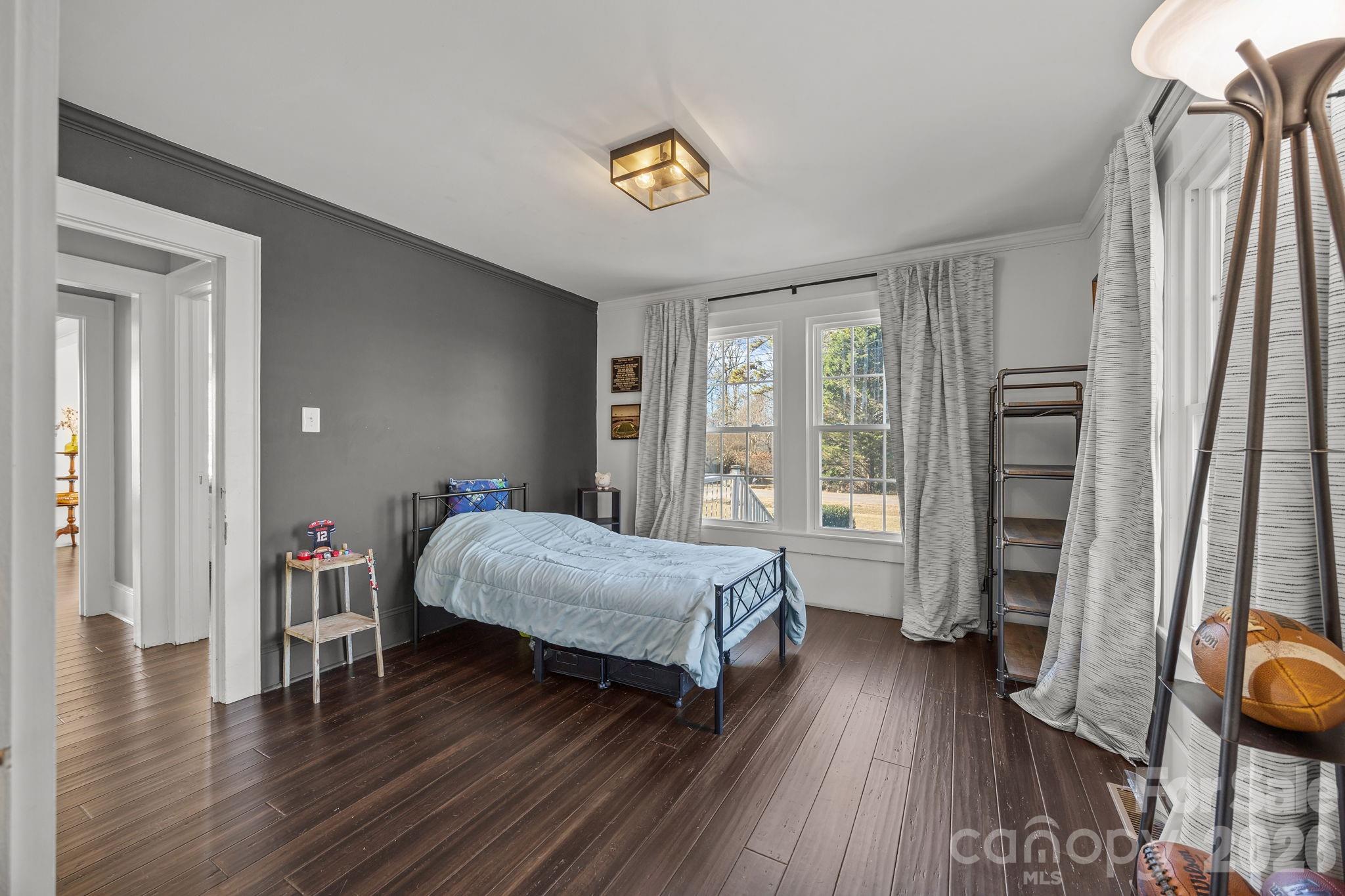 455 Eudy Road China Grove, NC 28023 - Photo 23 of 32 a bedroom with a bed and a window