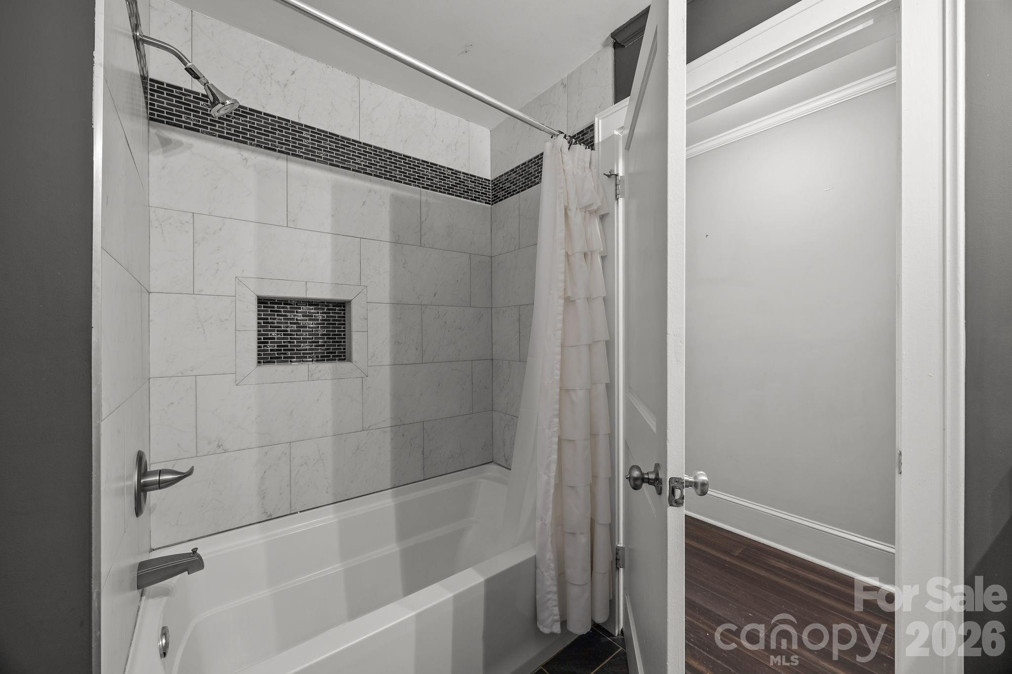 455 Eudy Road China Grove, NC 28023 - Photo 26 of 32 a bathroom with a shower and a glass door