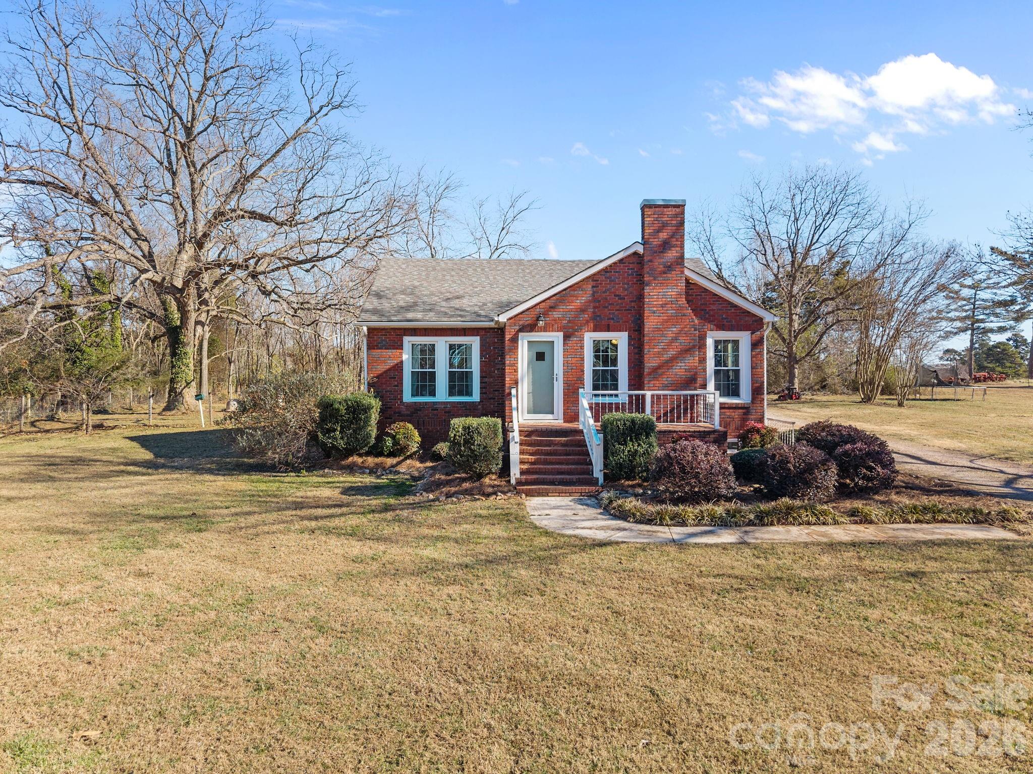 455 Eudy Road China Grove, NC 28023 - Photo 29 of 32 a front view of a house with a yard outdoor seating and yard