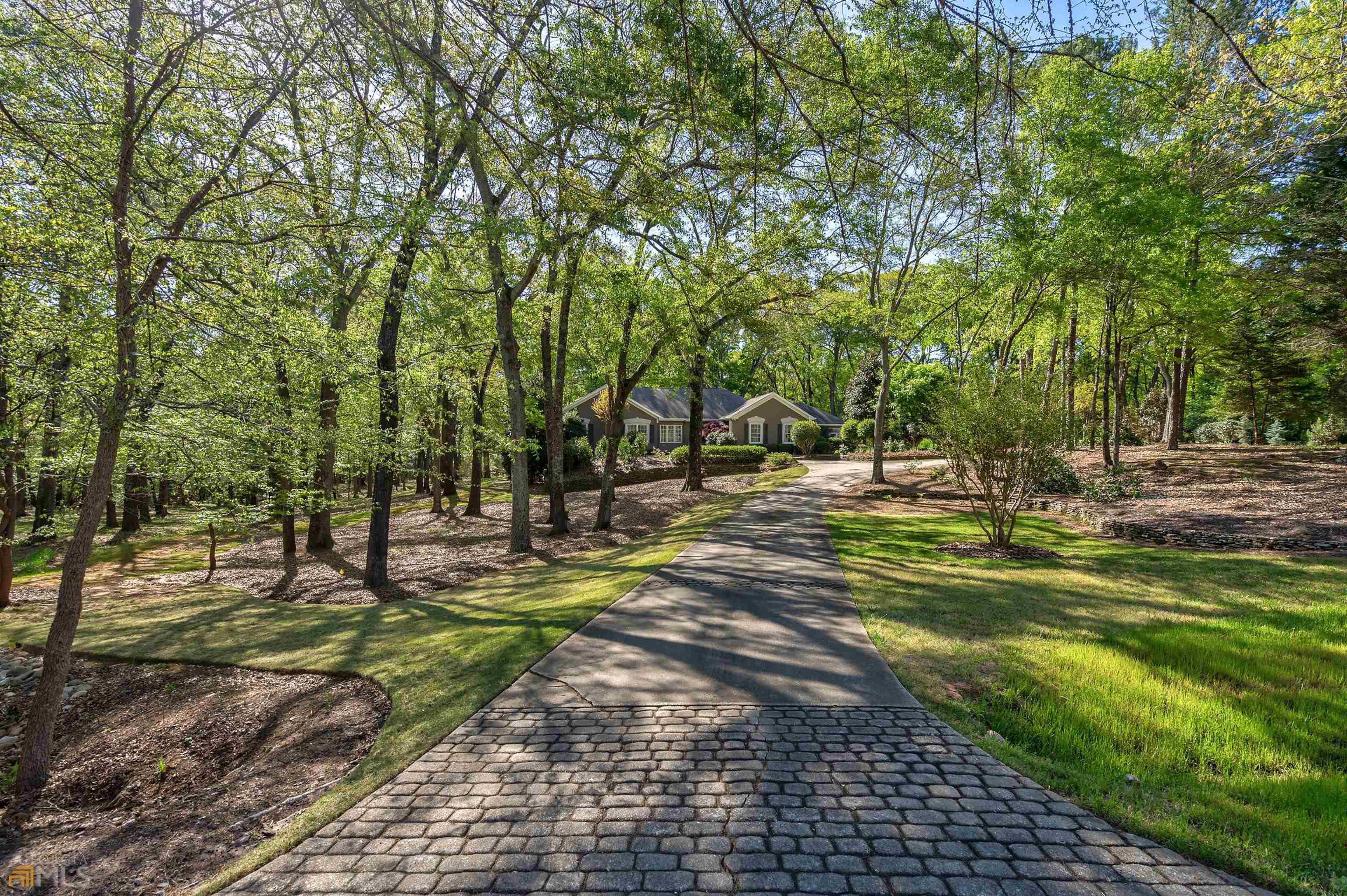 1290 Allgood Road, Unit REGENCY Athens, GA 30606 - Photo 1 of 1 a view of a park with large trees