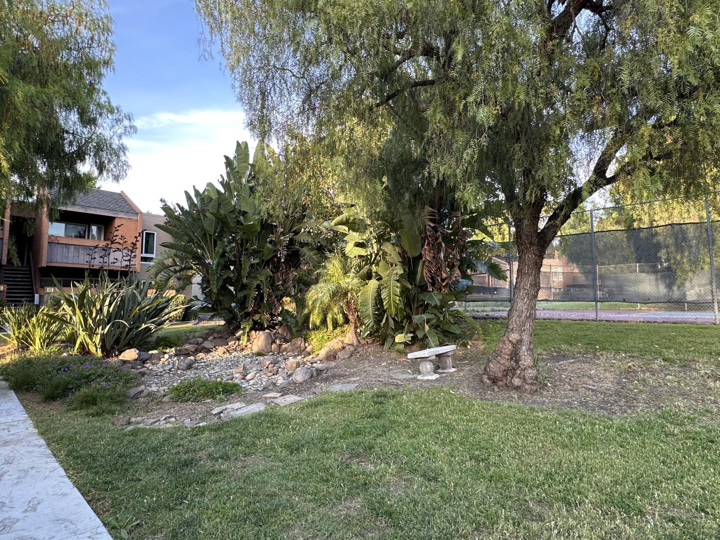 436 Dempsey Road, Unit 238 Milpitas, CA 95035 - Photo 13 of 16 a view of backyard with green space