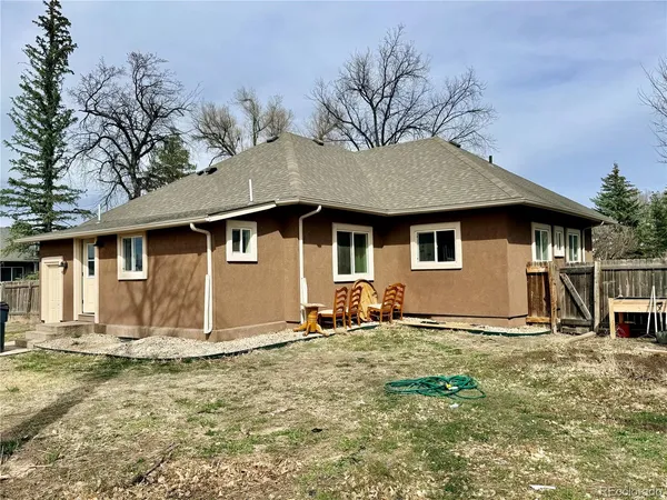 a house with yard in front of it