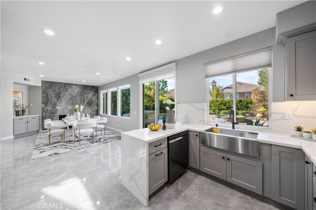 53 Middleton Irvine, CA 92620 - Photo 11 of 41 a kitchen with a sink and cabinets
