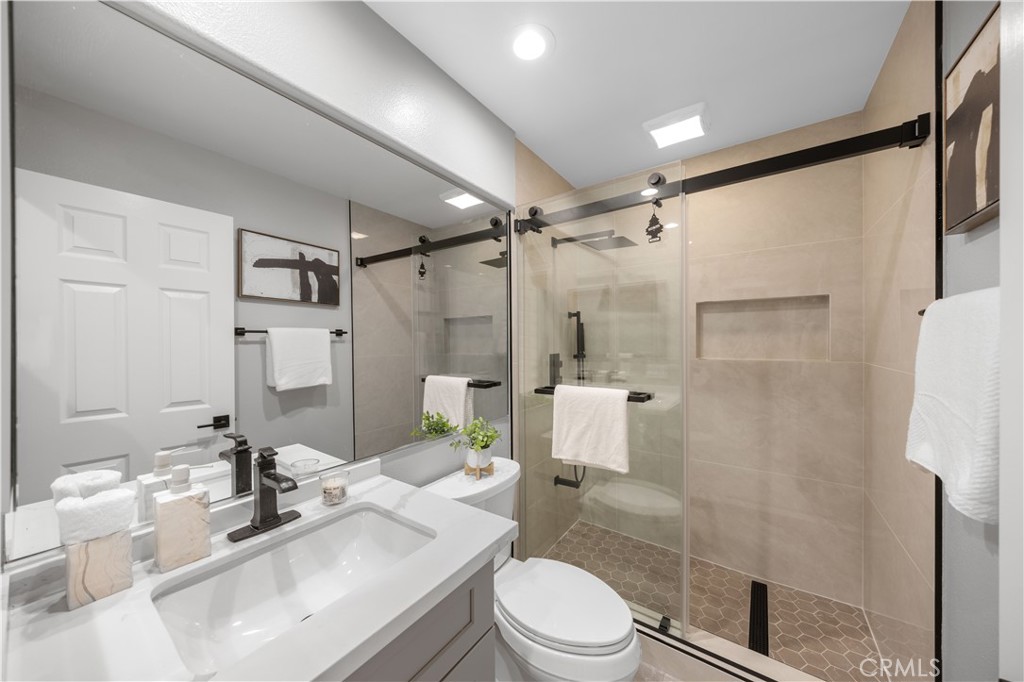 53 Middleton Irvine, CA 92620 - Photo 17 of 41 a bathroom with a sink toilet and shower
