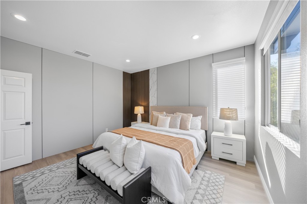 53 Middleton Irvine, CA 92620 - Photo 23 of 41 a bedroom with a large bed and a window