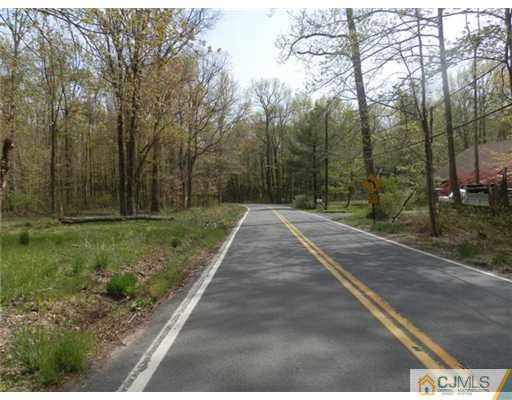 53 Haypress Road Cranbury, NJ 08512 - Photo 2 of 5 a view of a backyard