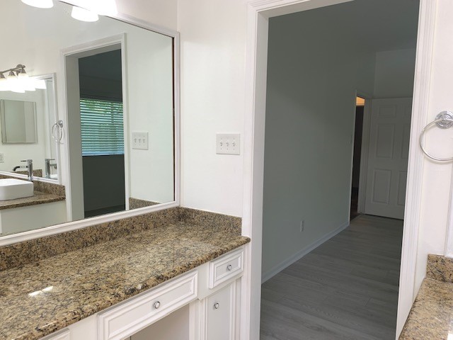 6650 Grove Field Lane Houston, TX 77084 - Photo 11 of 18 a view of bathroom and hallway