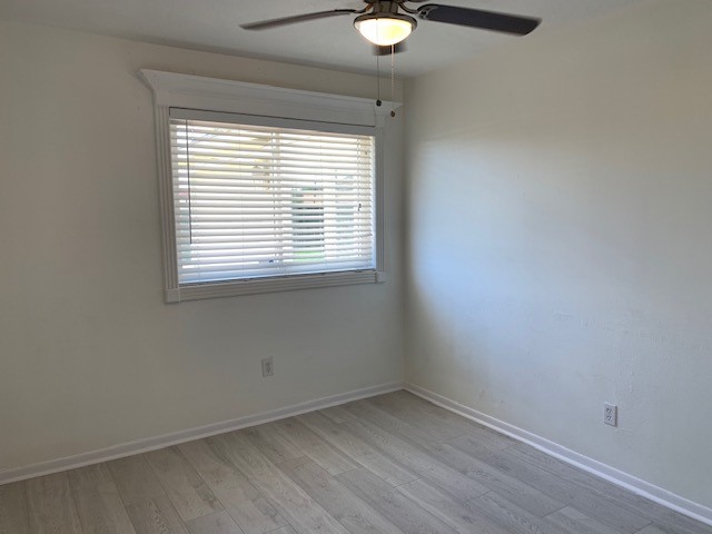 6650 Grove Field Lane Houston, TX 77084 - Photo 13 of 18 an empty room with a window