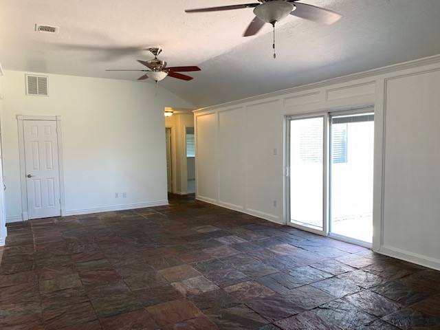 6650 Grove Field Lane Houston, TX 77084 - Photo 4 of 18 a view of an empty room with a ceiling fan