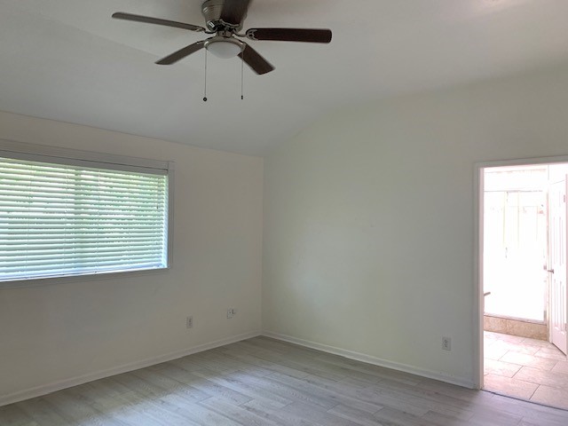 6650 Grove Field Lane Houston, TX 77084 - Photo 7 of 18 a view of an empty room with a window