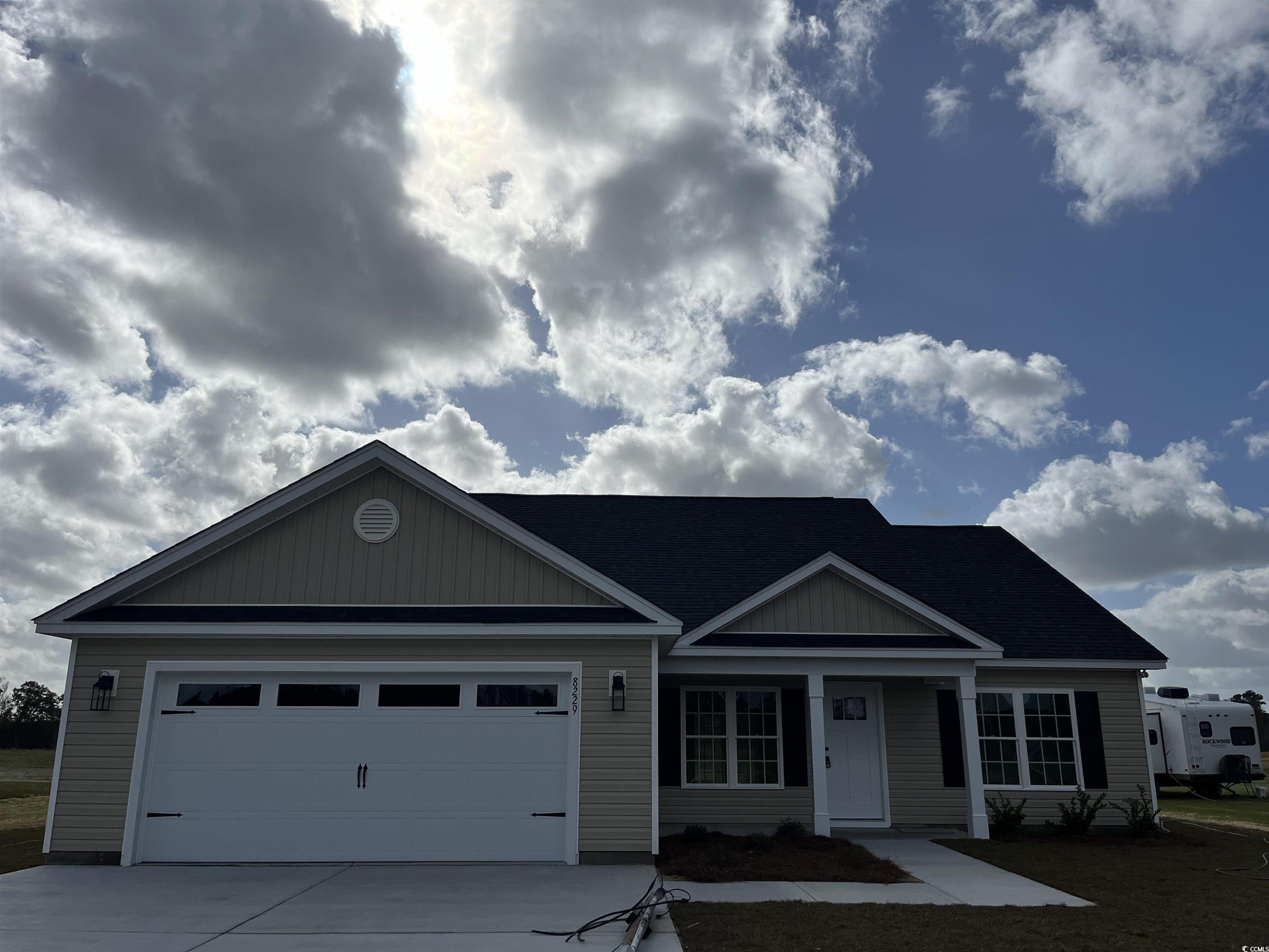 8229 Kerl Road Aynor, SC 29511 - Photo 1 of 19 View of front facade with a garage
