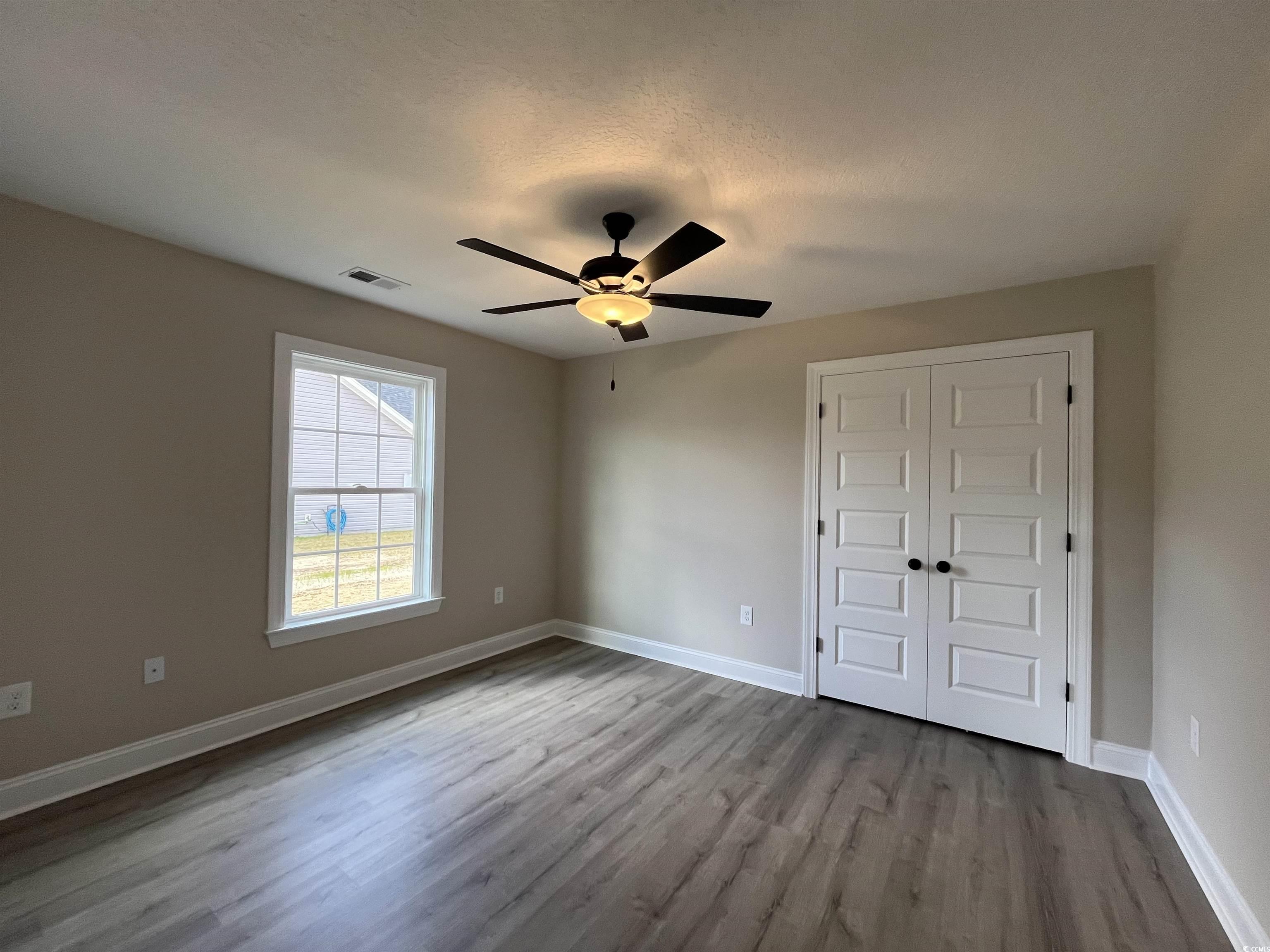 8229 Kerl Road Aynor, SC 29511 - Photo 12 of 19 Unfurnished bedroom featuring a textured ceiling,