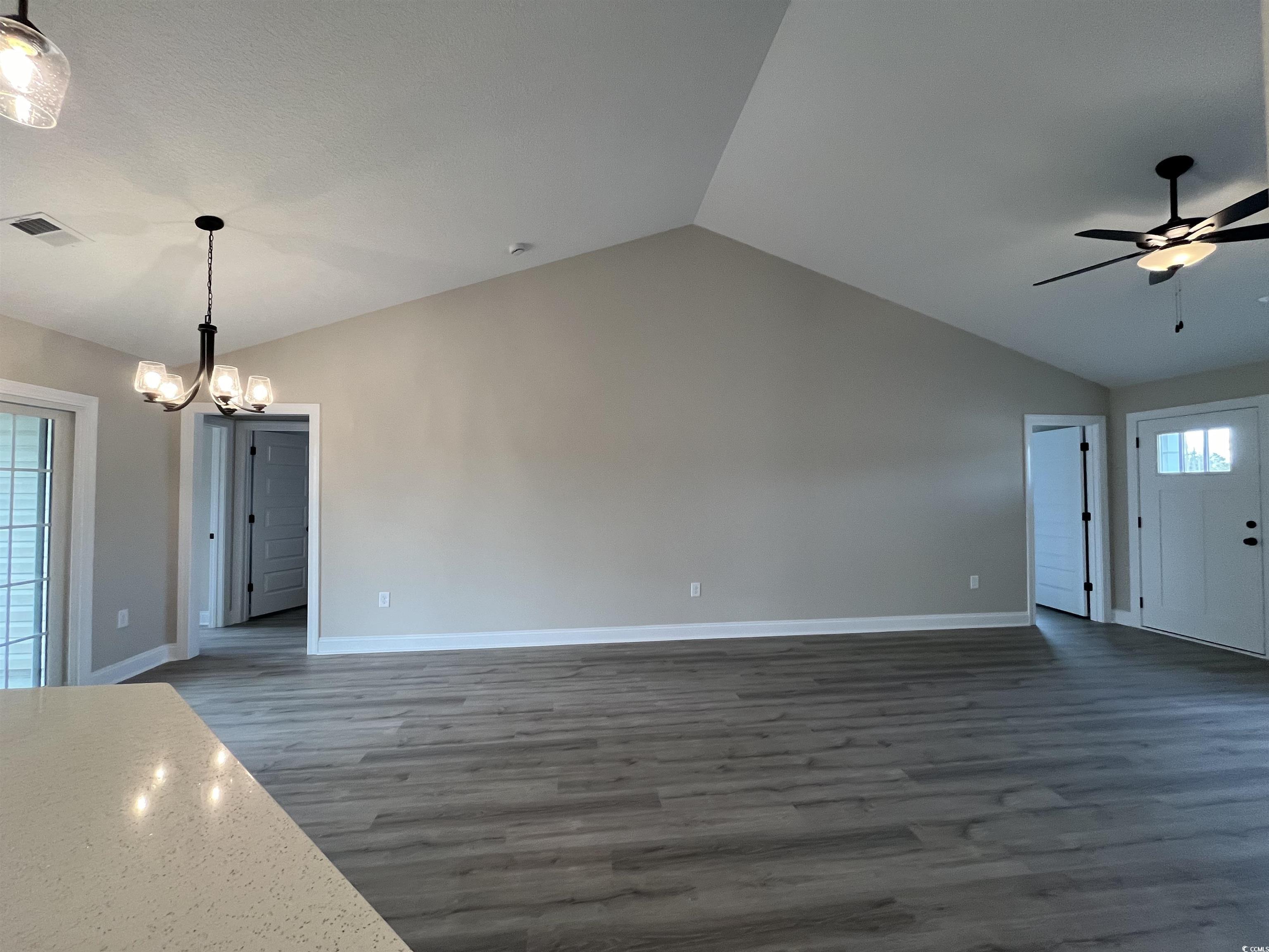 8229 Kerl Road Aynor, SC 29511 - Photo 3 of 19 Interior space featuring dark wood-type flooring,