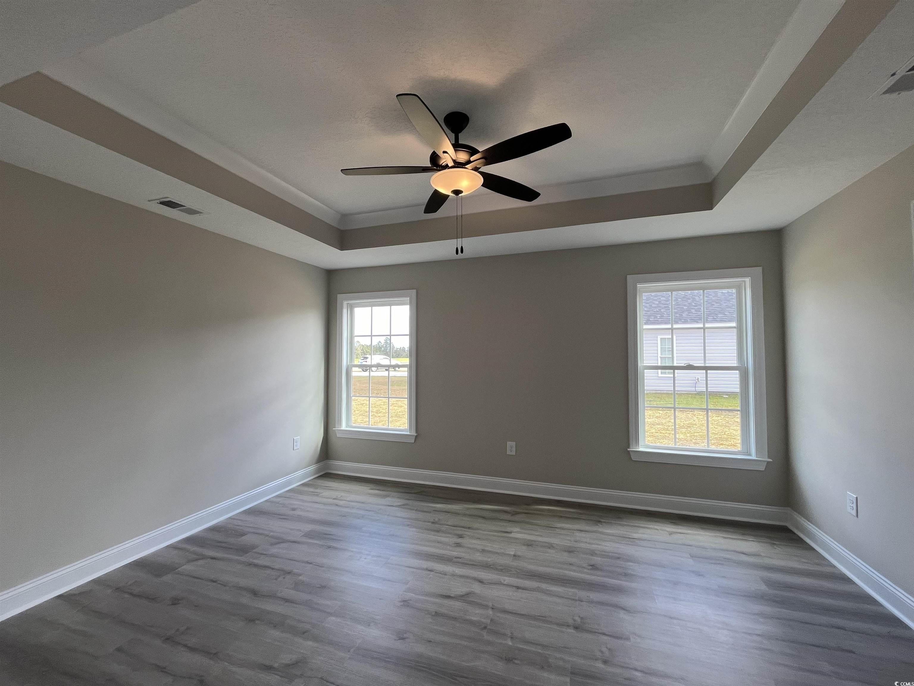 8229 Kerl Road Aynor, SC 29511 - Photo 9 of 19 Unfurnished room with ornamental molding, hardwood