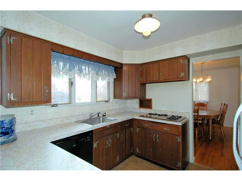 160 Pine Road Pittsburgh, PA 15237 - Photo 5 of 16 Kitchen. This view shows the wood cabinetry, dishwasher and cook top,you will also find a peninsula and eating area.Prfect space for you to create your dream kitchen