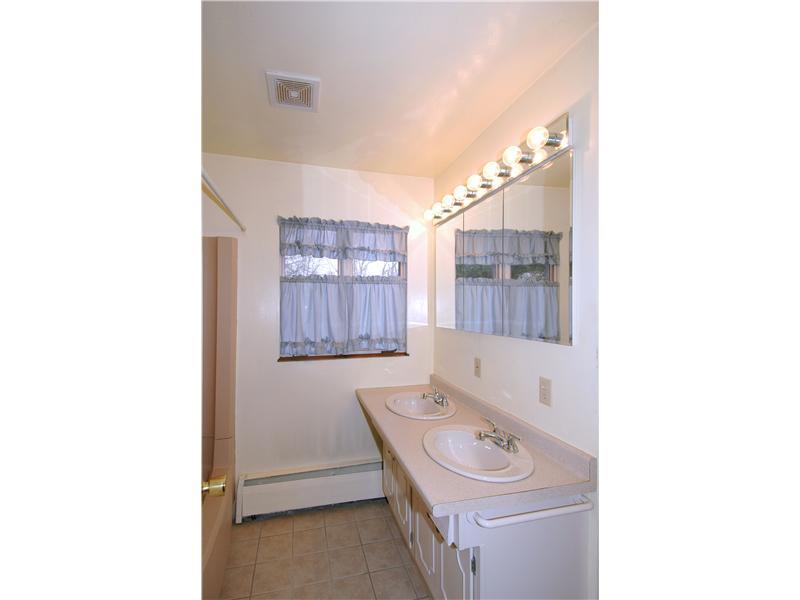 160 Pine Road Pittsburgh, PA 15237 - Photo 10 of 16 Full Bath. Hall bath has double bowl sink and tub surround and a window-add your personal touch