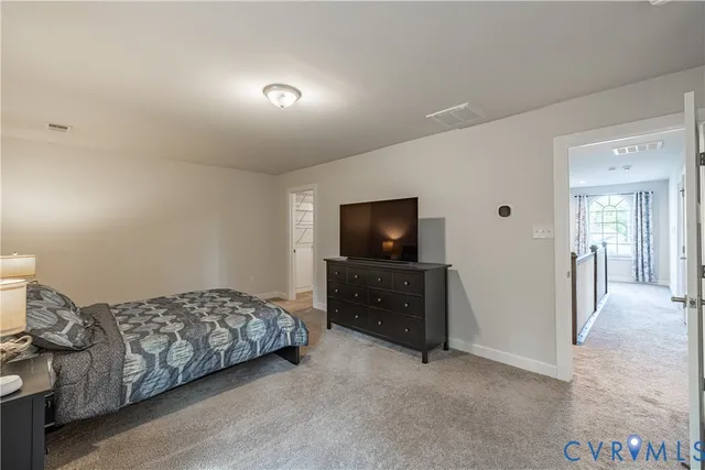 a view of backyard with deck and wooden floor