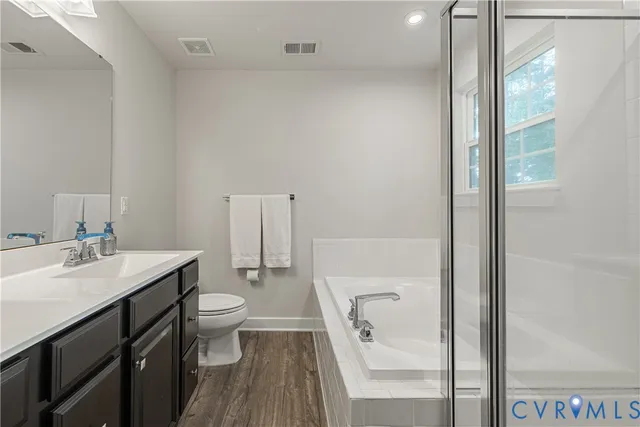 an aerial view of lake residential house with swimming pool and green space