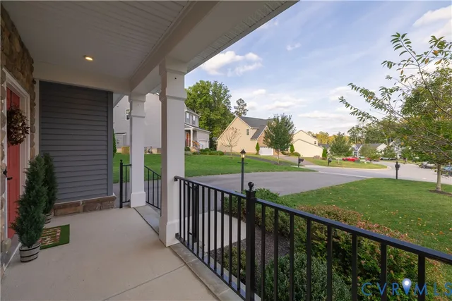 a view of livingroom with furniture and a large window