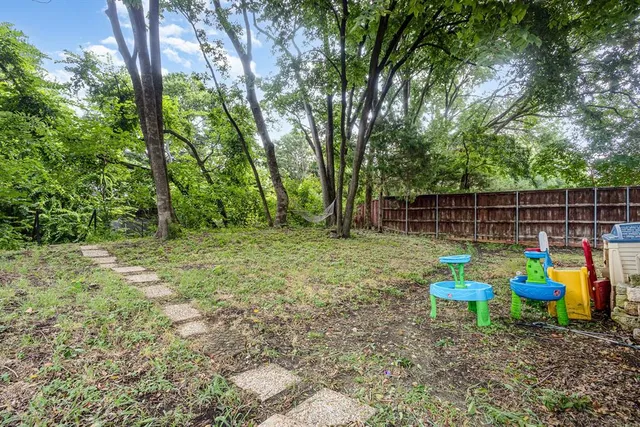 a view of a yard with a slide