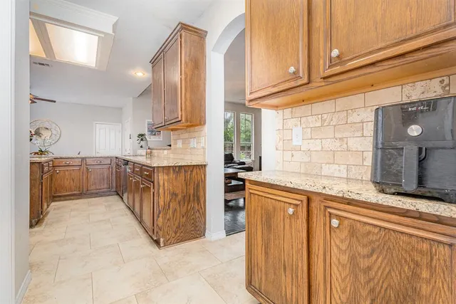 a bathroom with a toilet a sink and a mirror