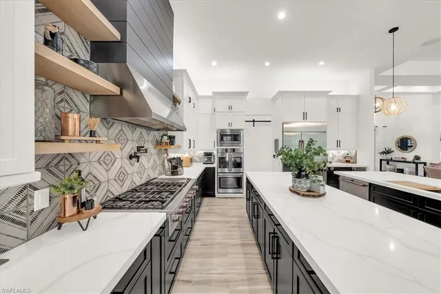 a kitchen with a sink stove and wooden cabinets