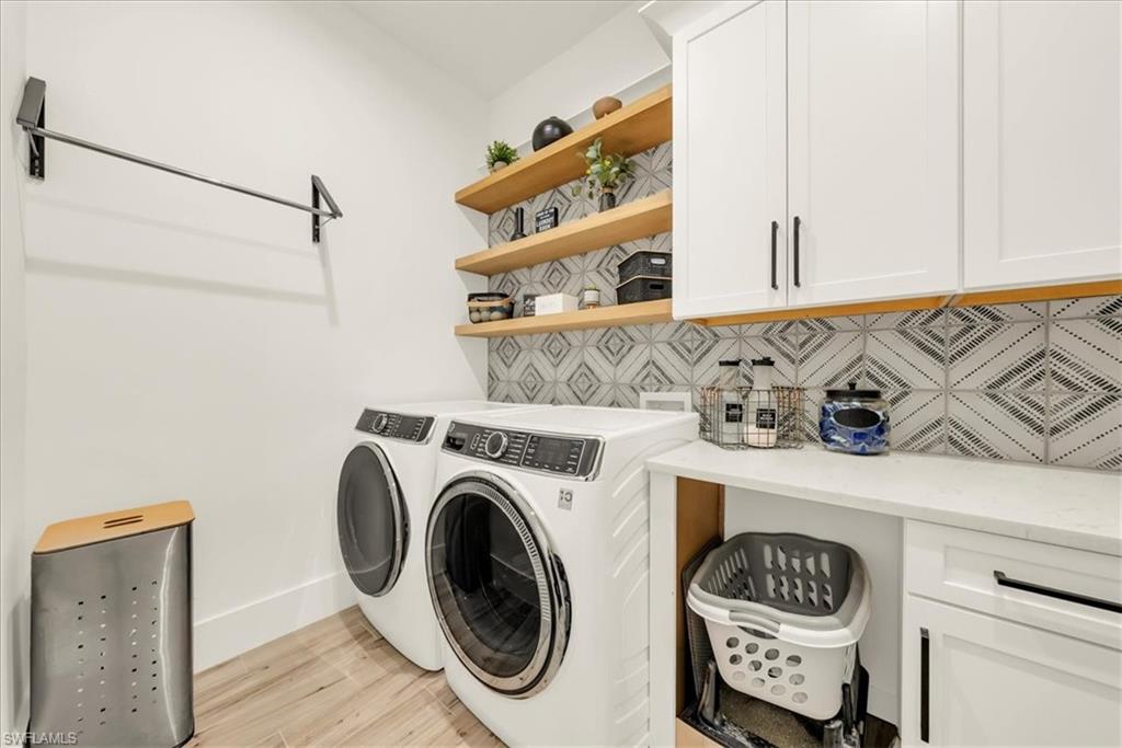 4186 3rd Avenue Northwest Naples, FL 34119 - Photo 29 of 50 a utility room with dryer and washer