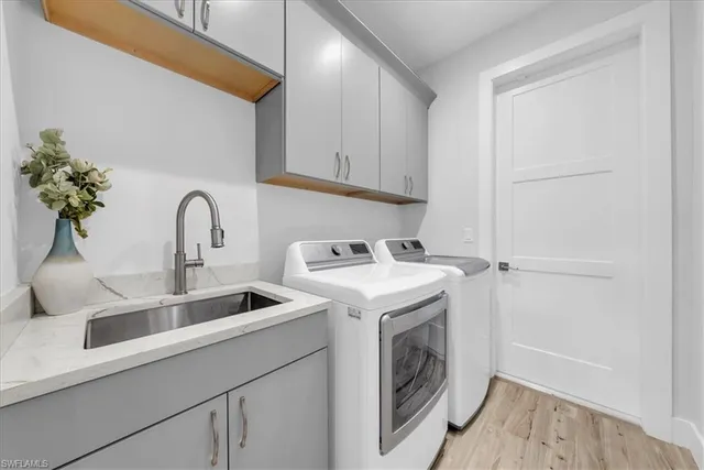 a living room with patio furniture and a large window