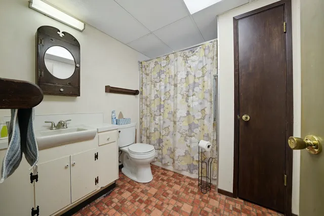 a kitchen with a stove and a microwave