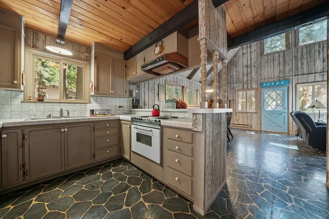 a view of a dining room with furniture window and outside view