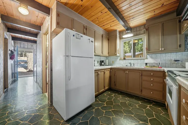 a outdoor living space with furniture and a rug