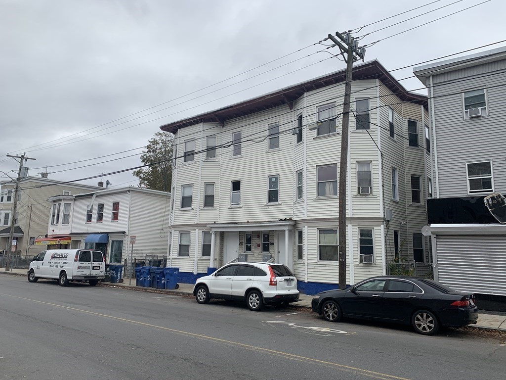 a car parked in front of a building