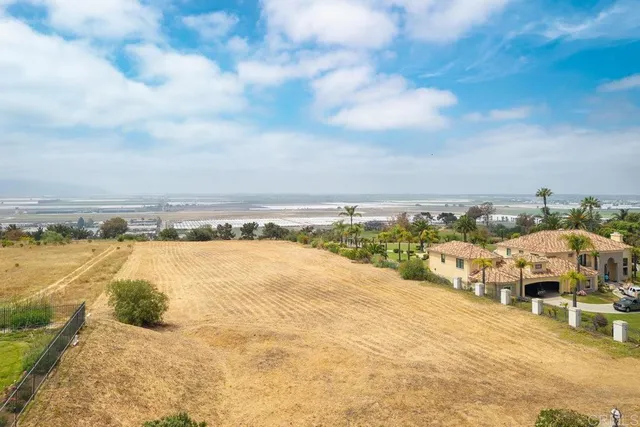 a view of a lake with a city