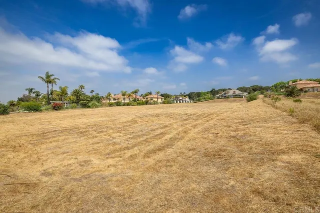 a view of an ocean and city