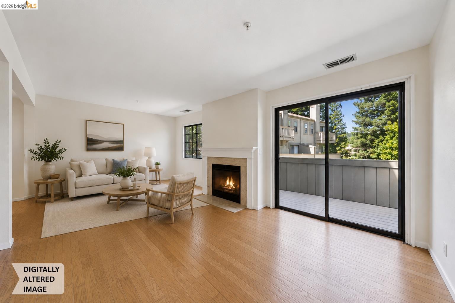 261 Redhawk Road Novato, CA 94949 - Photo 14 of 47 Spacious living area featuring wood-finish flooring, a fireplace with a mantel, and a large sliding glass door